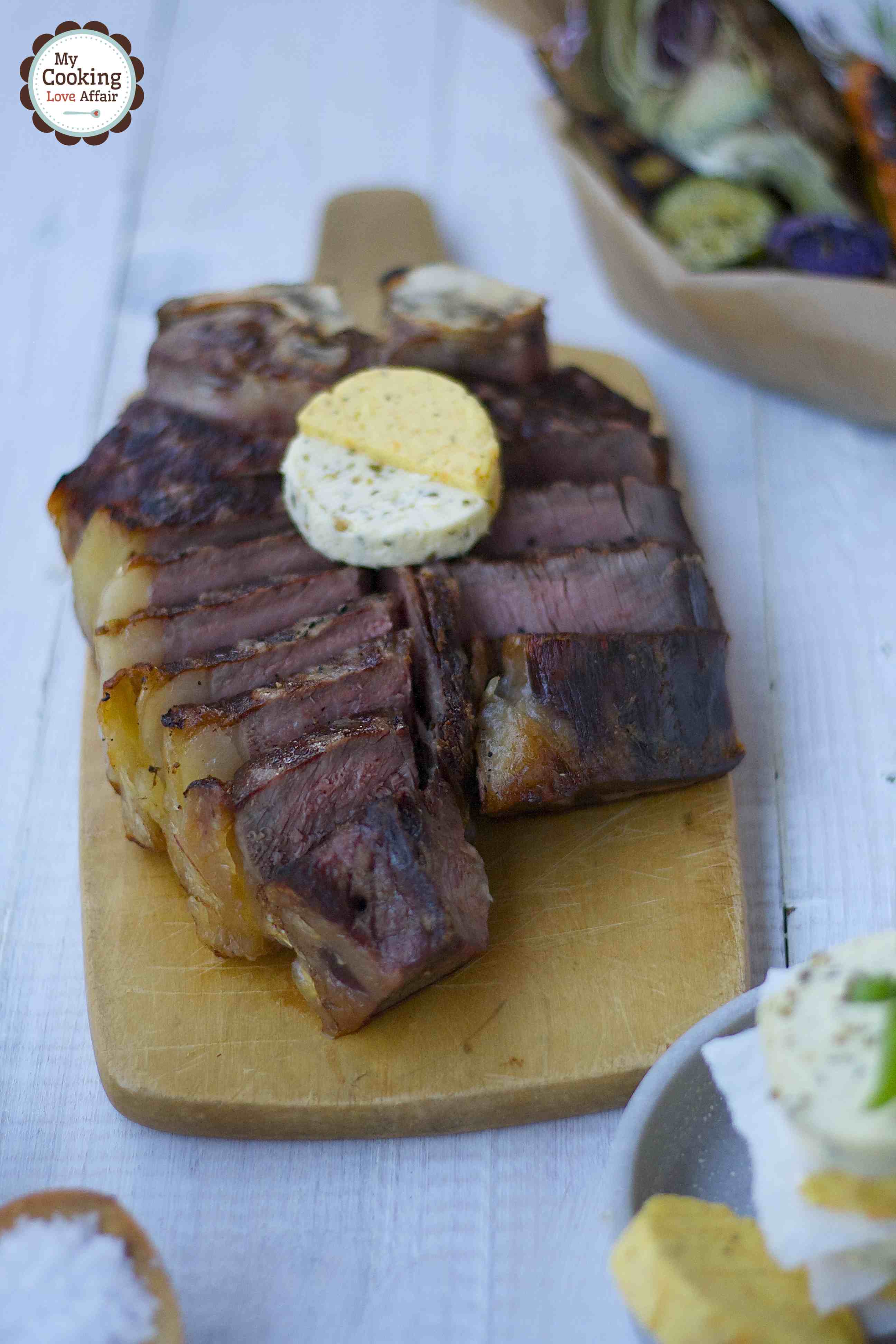 dryAged Porterhouse-Steak mit Grillgemüse und Kräuterbutter-Variationen
